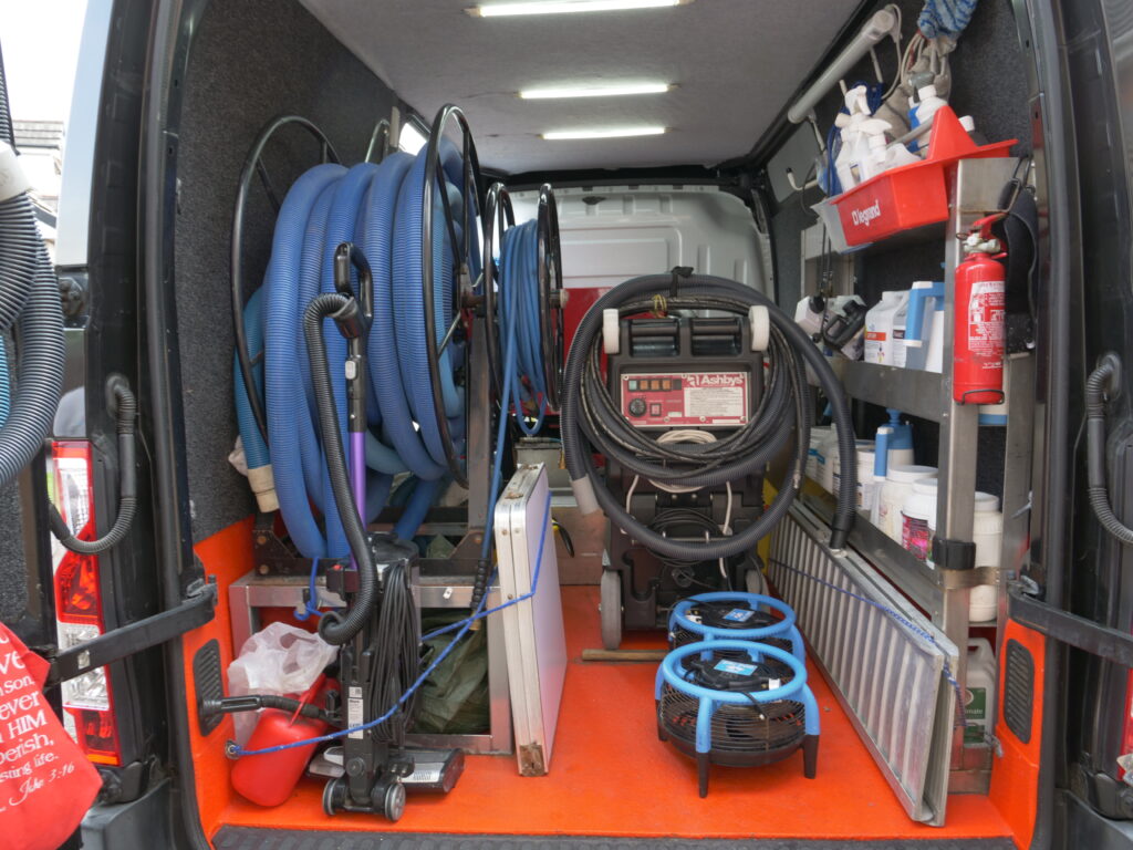 Back Of The Jem Carpet & Upholstery Cleaning Van, Showing Cleaning Equipment